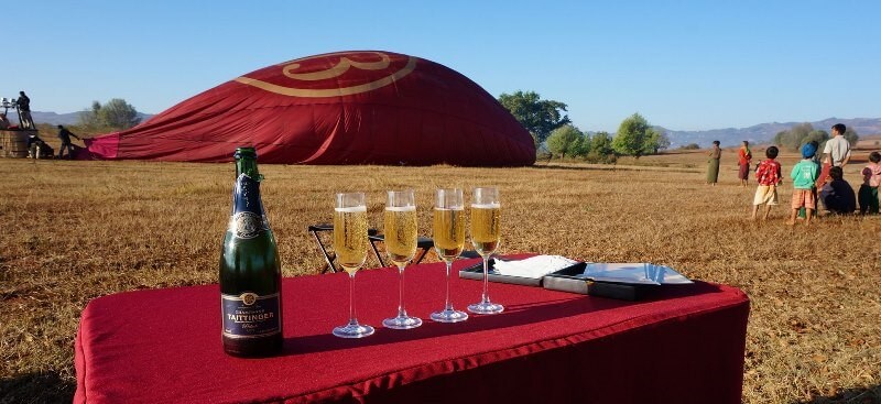 Following a successful flight, each passenger receives a certificate and a glass of champagne.